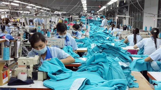 Garment Saigon Company's workers produce export items (Photo: SGGP) Garment Saigon Company's workers produce export items (Photo: SGGP)